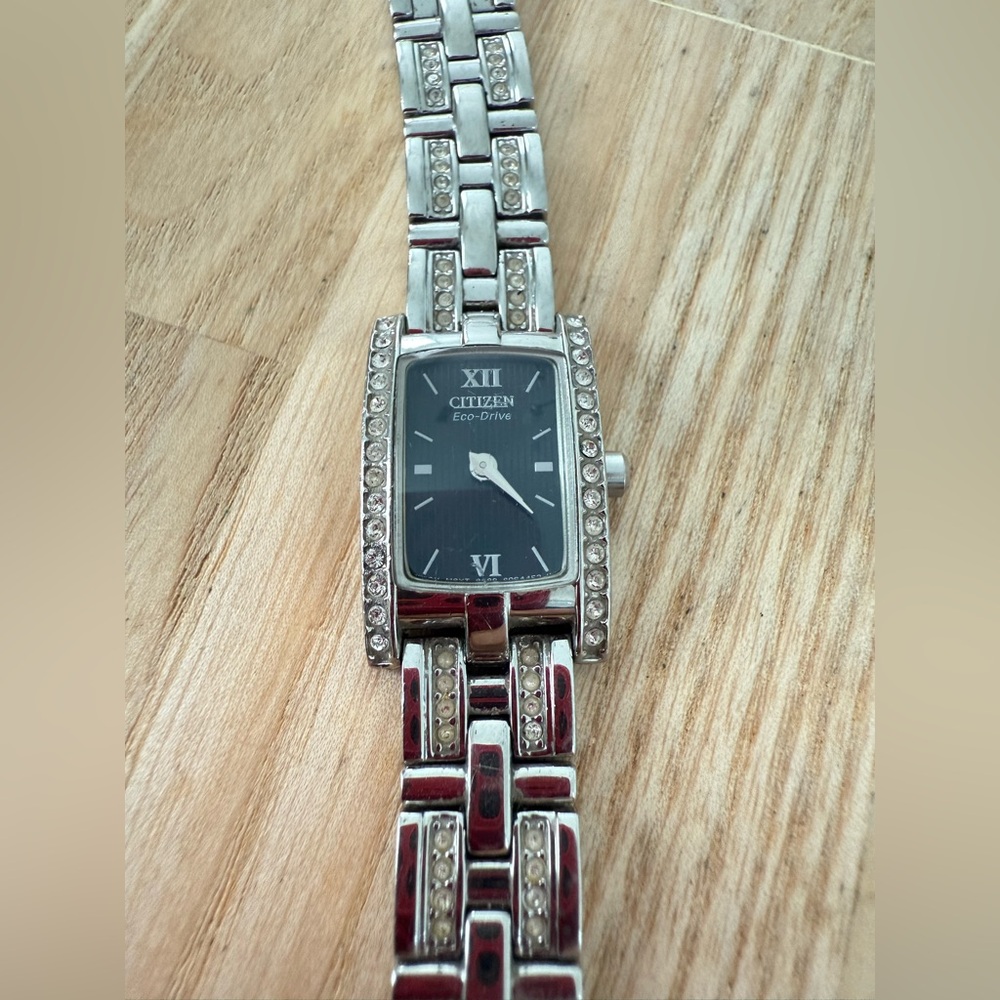 Citizen eco-drive ladies silhouette rectangular black dial silver tone watch